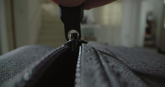 Close-up of the zipper of the bag that closes it. preparation for the trip. High quality 4k footage