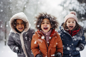 diverse group of kids playing with the snow, snowing, candid portrait - obrazy, fototapety, plakaty