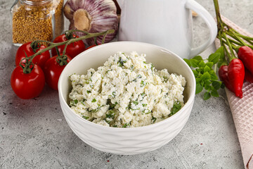 Curd cheese with green herbs