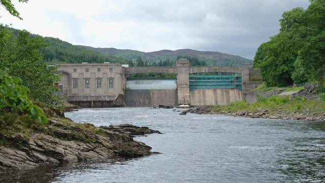 A rocky River Tummel and Pitlochry Dam during a summer in Pitlochry, Scotland
