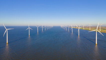 Ocean Wind Farm. Windmill farm in the ocean. Offshore wind turbines in the sea. Wind turbine from...