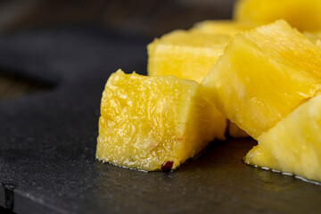 Sliced delicious ripe pineapple yellow, close up