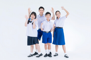 Thai students. Group of Asian students wearing school uniforms on a white background. Asian girl and boy in student uniform on white background.