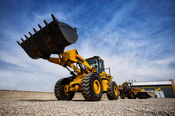 Front wheel loader for use in agriculture and construction