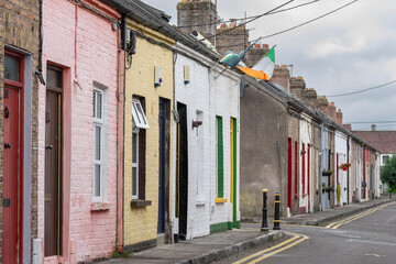 Fototapeta na wymiar Tithe Uí Argáin Horgan's Buildings, small houses from the second half of the 20th century, Cork, Ireland, United Kingdom