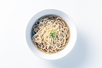 Noodles in a plate top view