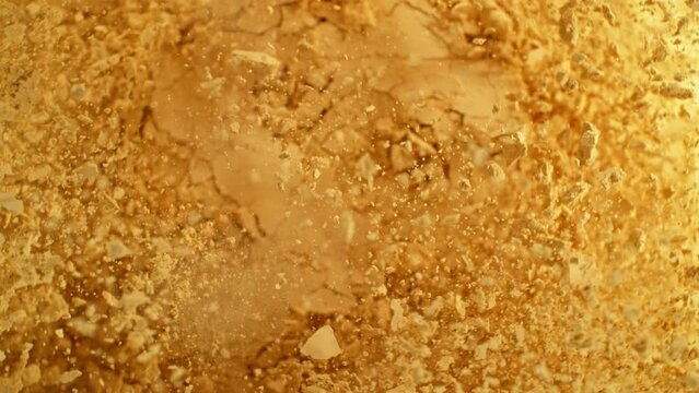 Super Slow Motion Shot of Brown Makeup Cosmetic Powder Explosion at 1000 fps.