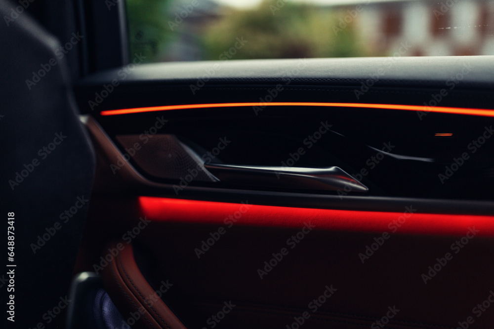 Poster Modern car door panel illumination. Car interior illumination 