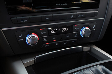 Car climate control. Climate control dashboard display. Luxury car air conditioner.