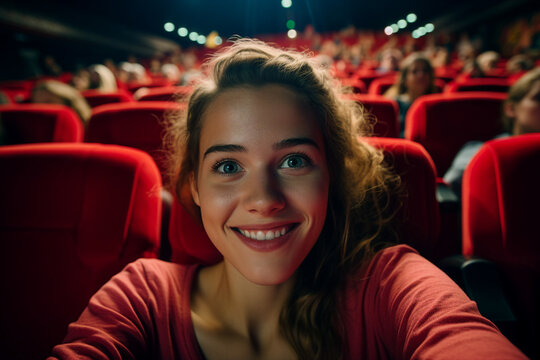 Generative AI picture of young pretty girl making selfies at cinema room seat