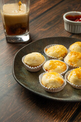 'empadinhas' or mini pie on a dark plate