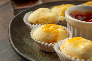 'empadinhas' or mini pie on a dark plate
