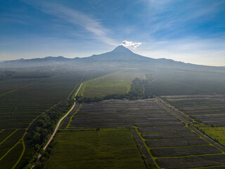 Mount Matutum stratovolcano overlooks the city of General Santos in southern Mindanao, Philippines....