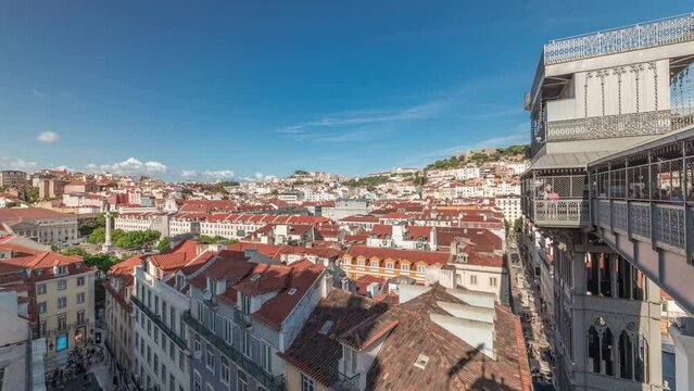 Panorama showing Alfama and Baixa districts of Lisbon aerial timelapse, Portugal, with the castle of Sao Jorge and the panoramic terrace of historical Santa Justa lift, old iron elevator from above
