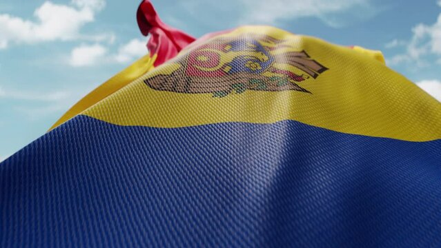 Wavy flag of Moldova blowing in the wind in slow motion. Waving official Moldovan flag team symbol abstract vertical background. Blue sky with clouds. World countries flying flags concept