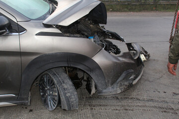 Front of car damaged and broken by accident on the road. Car crash, In car accident bumper got...