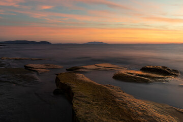 Long exposure on the sea between Piombino and Elba island at the sunset. - 648911015