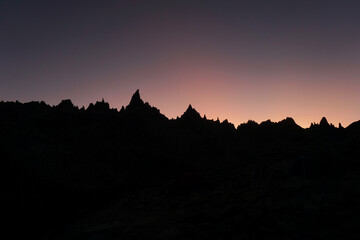 Milky way over the mountains at night with stars in the sky