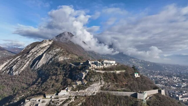 Aerial: Grenoble's Bastille stands sentinel by the winding Is&egrave;re River.
