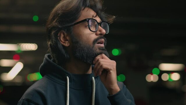 Arabian unhappy anxious worried stressed depressed man headache business problem failure job lost guy feel stress confusion despair grief at parking Hispanic Indian male thinking complicated decision