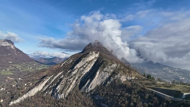 Bird's-eye view of Grenoble: Alpine beauty and the Bastille's shadow cradle a city of history and modern commerce.
