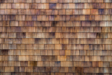 Westen red cedar shingles background texture pattern makes a natural organic wooden wall siding for...