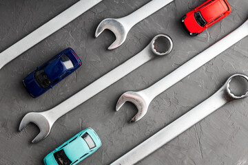 top view of cars and wrenches, toy car models