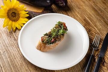 Delicious bruschetta with vegetables and meat