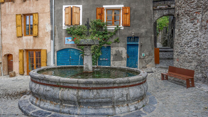 Fototapeta na wymiar A look at the Anselme fountain in the Ancient City of Albertville, France.