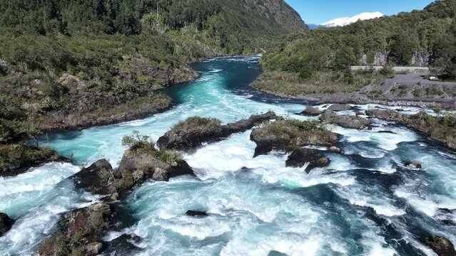 Petrohue Waterfall At Petrohue Los Lagos Chile. Waterfalls Petrohue Los Lagos. Nature Romantic Snow Covered Forest Trees. Nature Drone View Snow Covered Patagonia Frost.