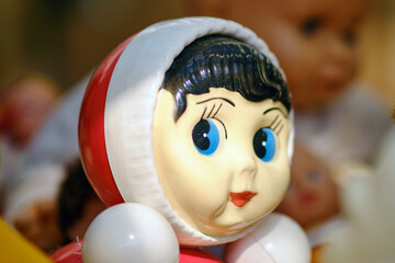 Closeup of a beautiful baby doll USSR in a children's playroom