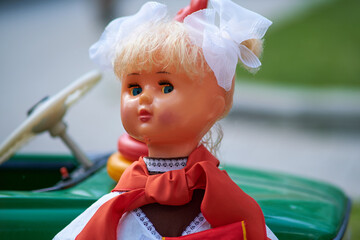 Vintage doll in the school pioneer uniform of the USSR