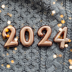 Happy New Year 2024 Postcard. Number 2024 on gray knitted background. Copy space - 648956276