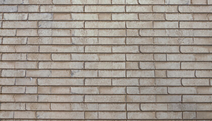 Obraz premium 白っぽいブラウンカラーの住宅の壁のタイルのテクスチャ