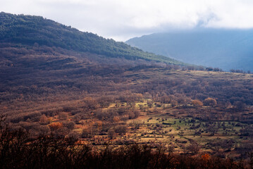 Aerial drone view of the Mountain Range of Rincon in Madrid during autumn Sierra del Rincon in Madrid