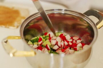 cooking Soup kholodnik red on an unusual tray. Food