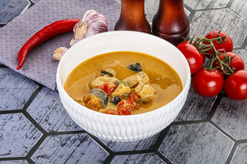 Traditional yellow Thai curry with chicken