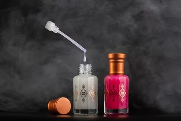 Fotobehang Misk Perfume: Captivating Aromas of the Orient,with smokey background  © Klay
