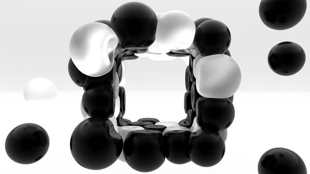 Black and fogy glass soft spheres on gray back