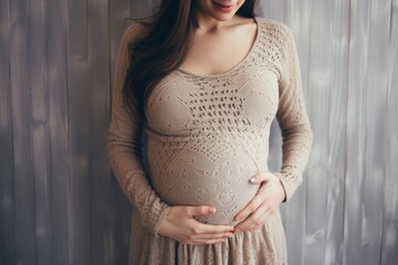 A pregnant woman posing elegantly in a beautiful dress created with Generative AI technology