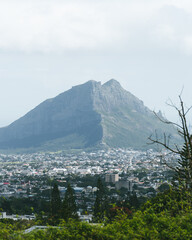 Panoramic and fantastic view of Curepipe and the Three Mammals Mountains Mauritius. Balcony of trou aux cerfs, deer hole. Opposite is part of the Mauritian city or village.