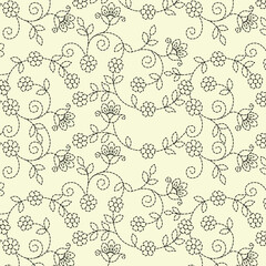 A monochromatic pattern of vines and leaves