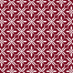 A vibrant red and white geometric pattern