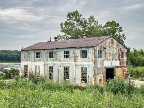 abandoned industrial building at old shipyard on the shore of Missouri River