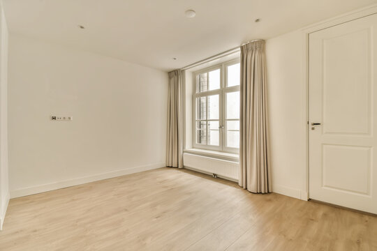 Living room with window and curtains at home