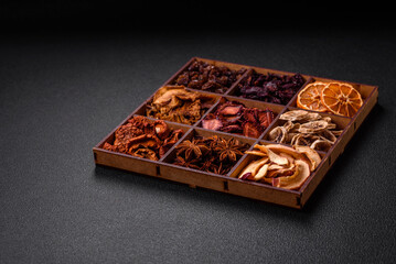 Variation of dry fruits strawberry, apple, cherry, banana, peach, plum and star anise