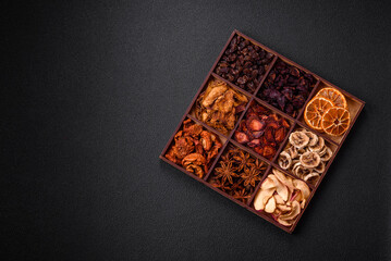 Variation of dry fruits strawberry, apple, cherry, banana, peach, plum and star anise