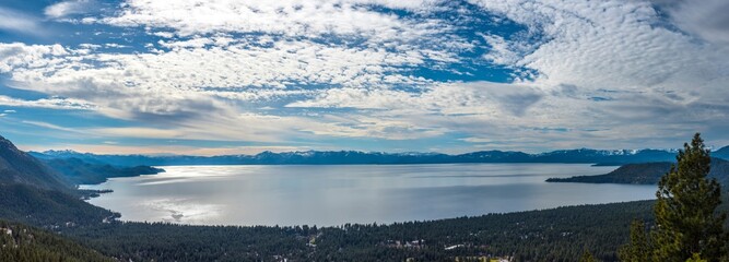 Tranquil Tahoe Beauty: 4K Image of Lake Tahoe View from Lakeshore with Stone and Sky