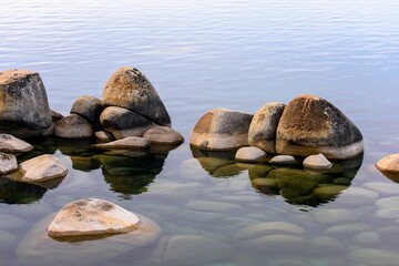 Tranquil Tahoe Beauty: 4K Image of Lake Tahoe View from Lakeshore with Stone and Sky