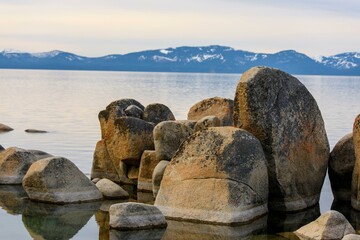 Tranquil Tahoe Beauty: 4K Image of Lake Tahoe View from Lakeshore with Stone and Sky